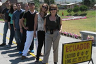 Students in Ecuador straddle the equator with Professor Maria Donoso-Clark in front.